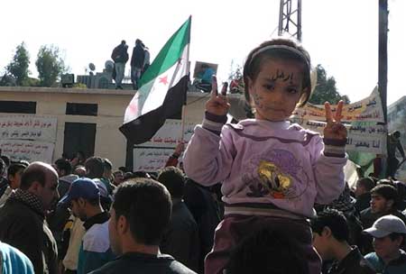 Siria-niña-protesta-AFP